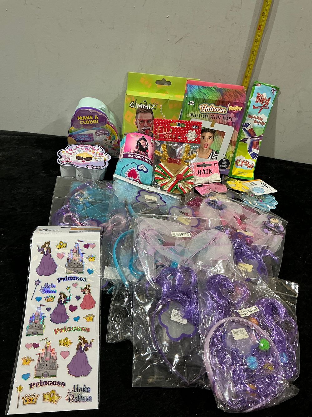 Lot 303: An Assortment of Childrens Toys Party Novelties and Hair Accessories