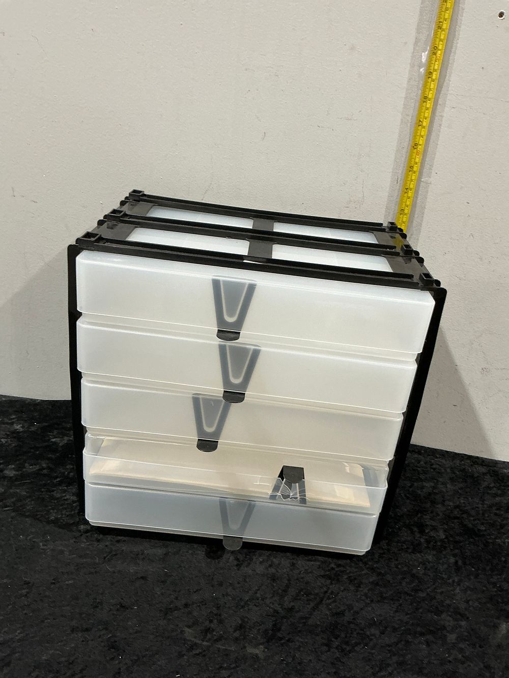 Lot 309: A Five-Drawer Plastic Modular Storage Unit with Black Frame and Frosted Drawers