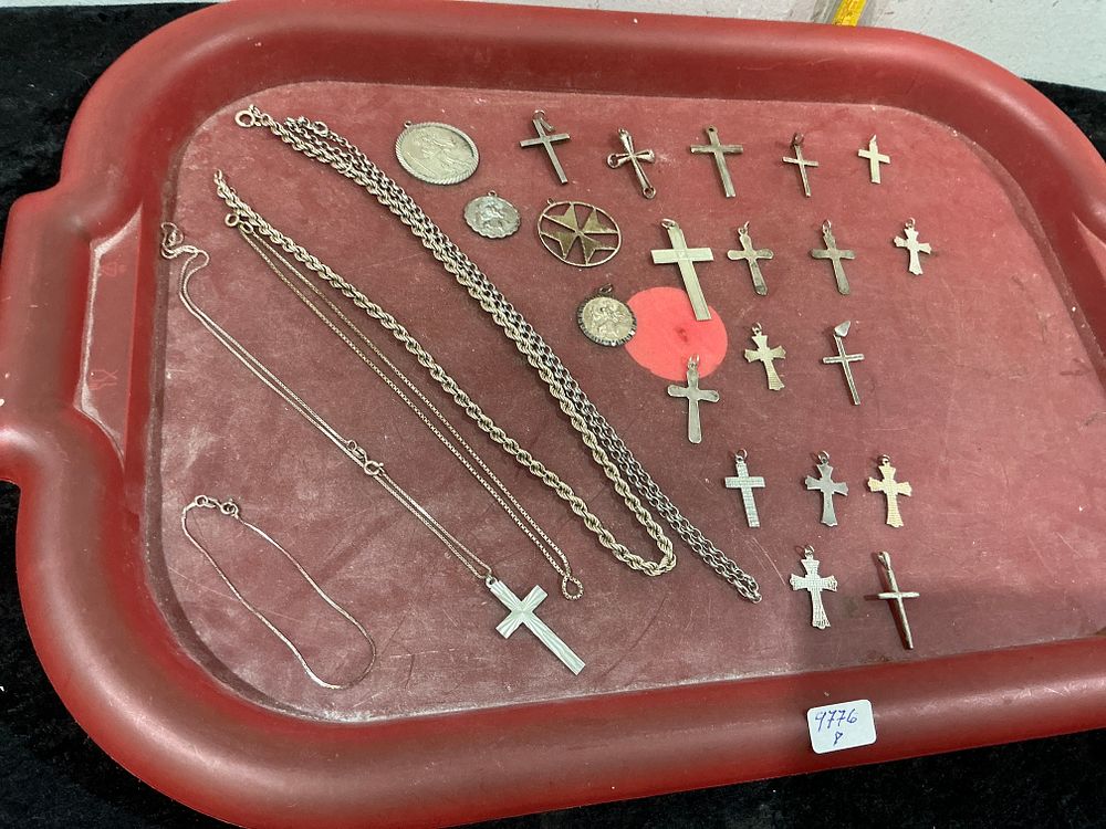 Lot 357: A Collection of Approximately Twenty-Six Silver-Toned Religious Pendants and Necklaces