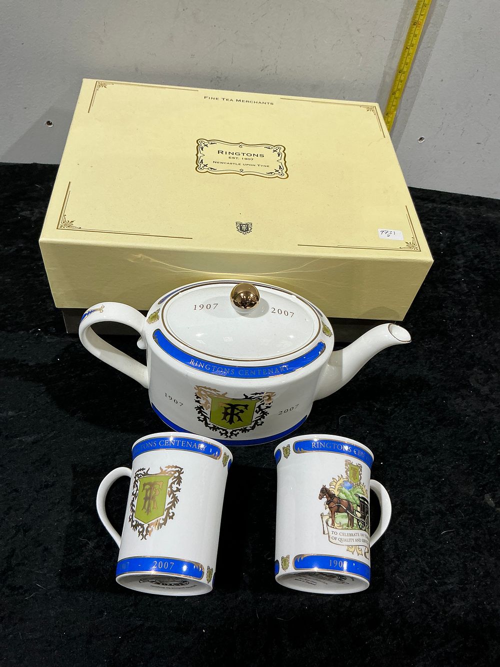 Lot 379: A Trio of Ringtons Centenary Commemorative Ceramic Items and Original Box