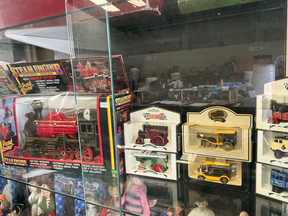 Lot 159: A Collection of Vintage Toys Including a Road Power Battery-Operated Steam Engine, Lledo Days Gone Die-Cast Models, and Dolls