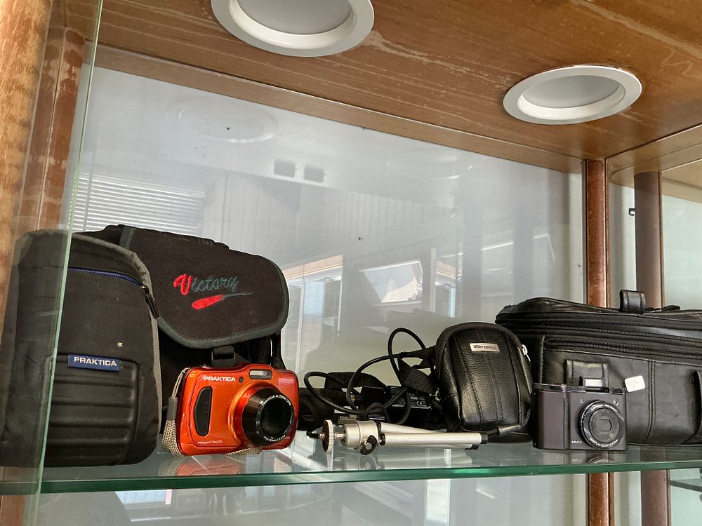 Lot 168: An Assortment of Digital Compact Cameras and Photographic Accessories including Praktica and Samsung Models