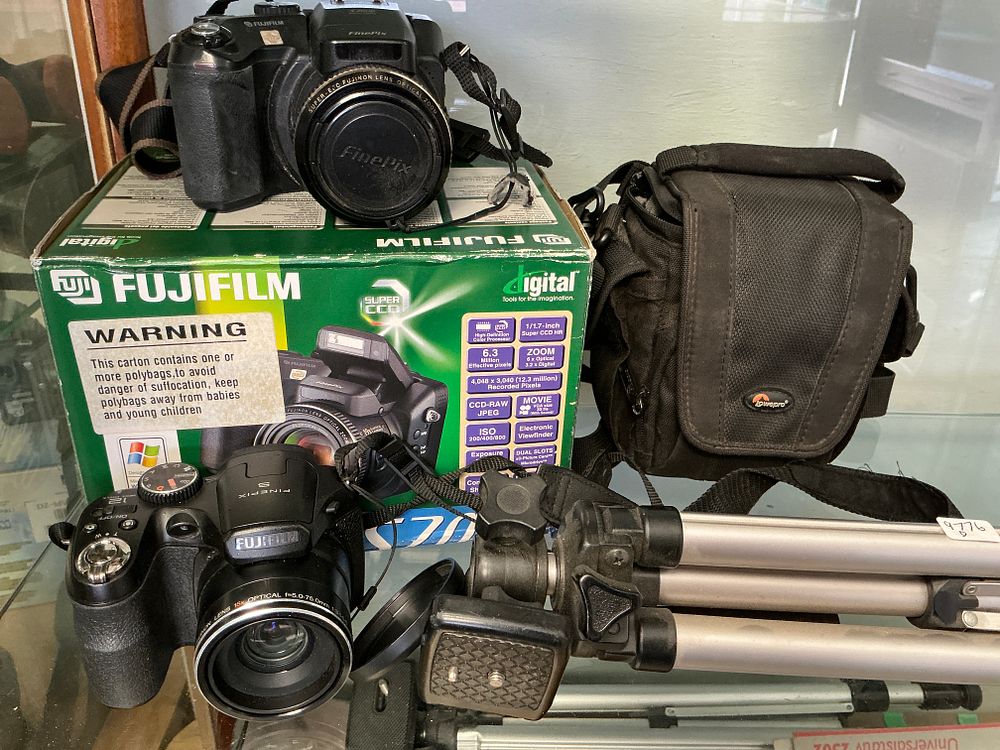 Lot 171: A Pair of Fujifilm FinePix Digital Bridge Cameras with Tripod and Bag