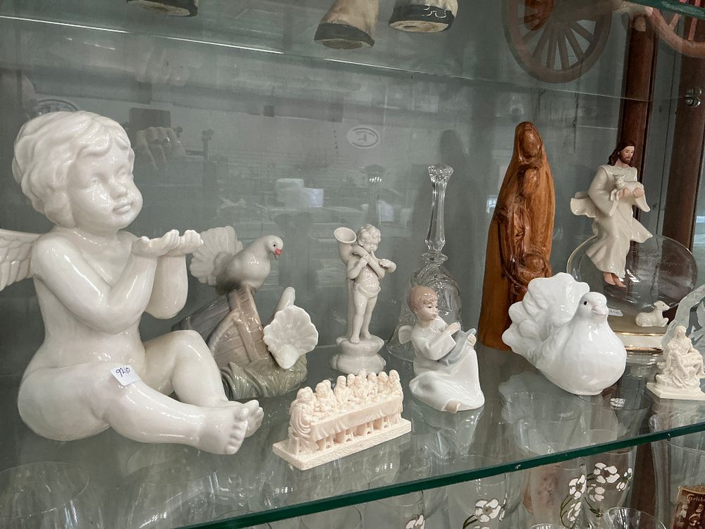 Lot 237: A Collection of Ceramic and Porcelain Decorative and Religious Figurines