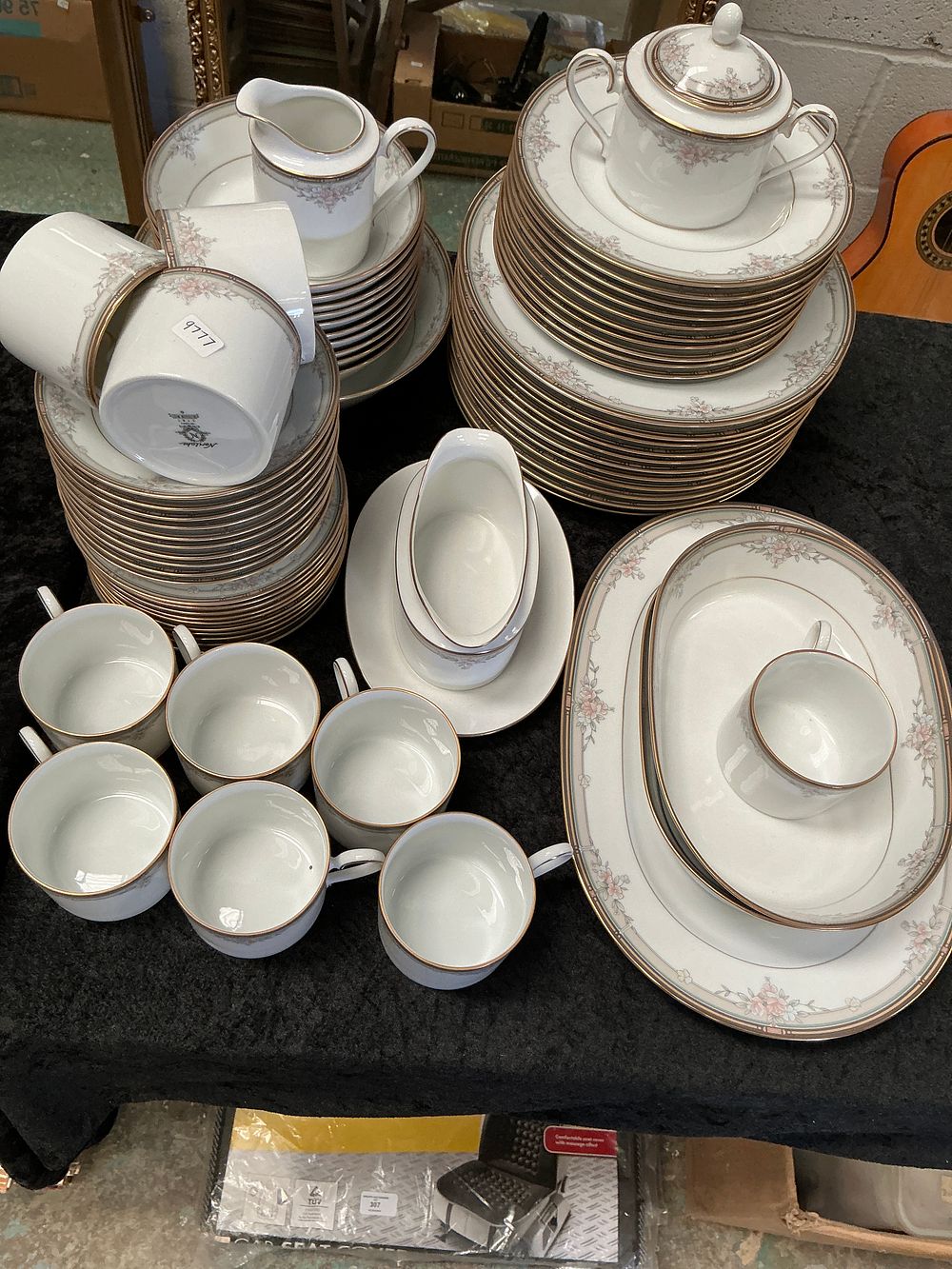 Lot 338: A Noritake Sweet Leilani Pattern Porcelain Dinner and Tea Service