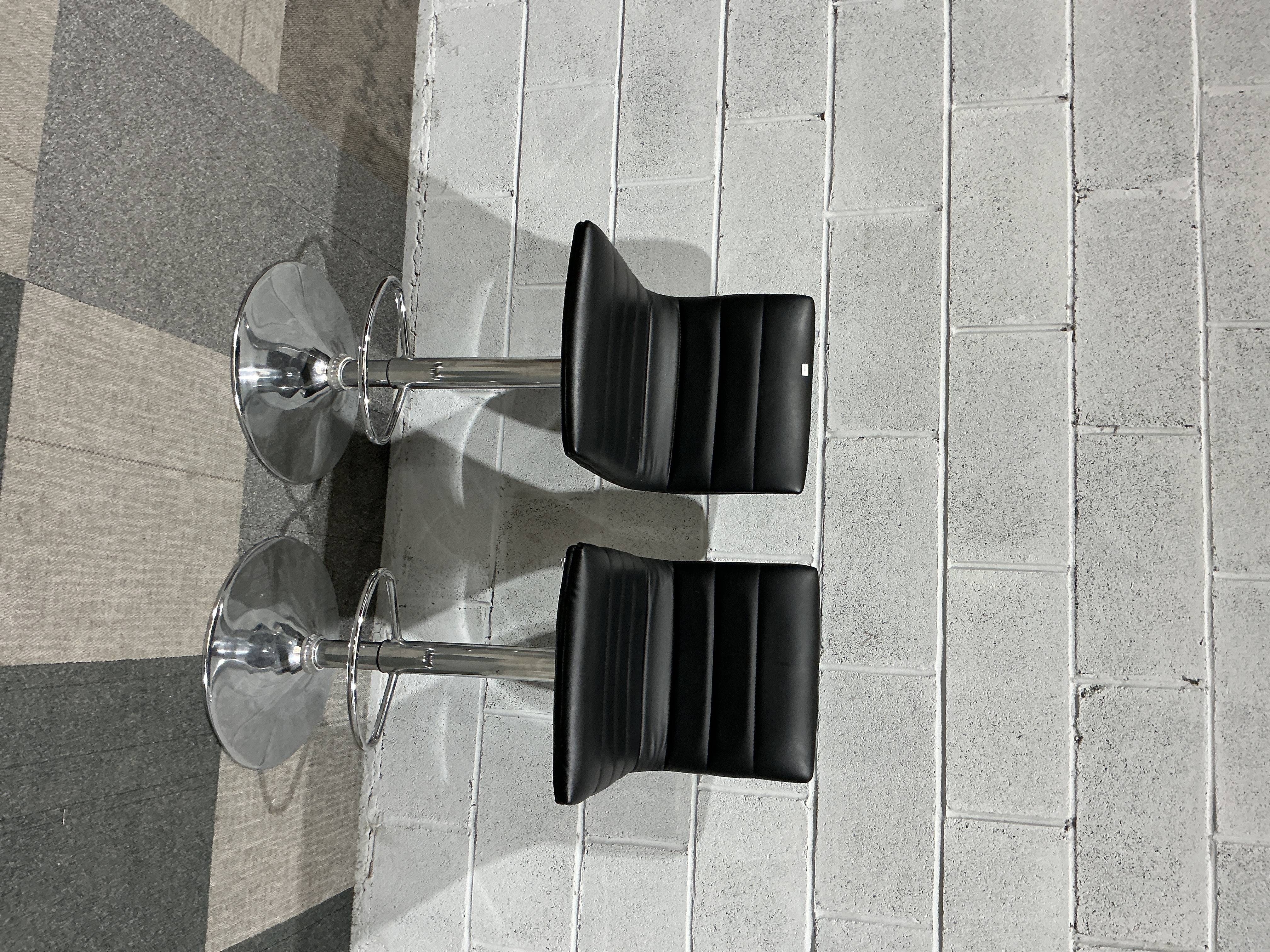 A Pair of Modern Adjustable Swivel Bar Stools