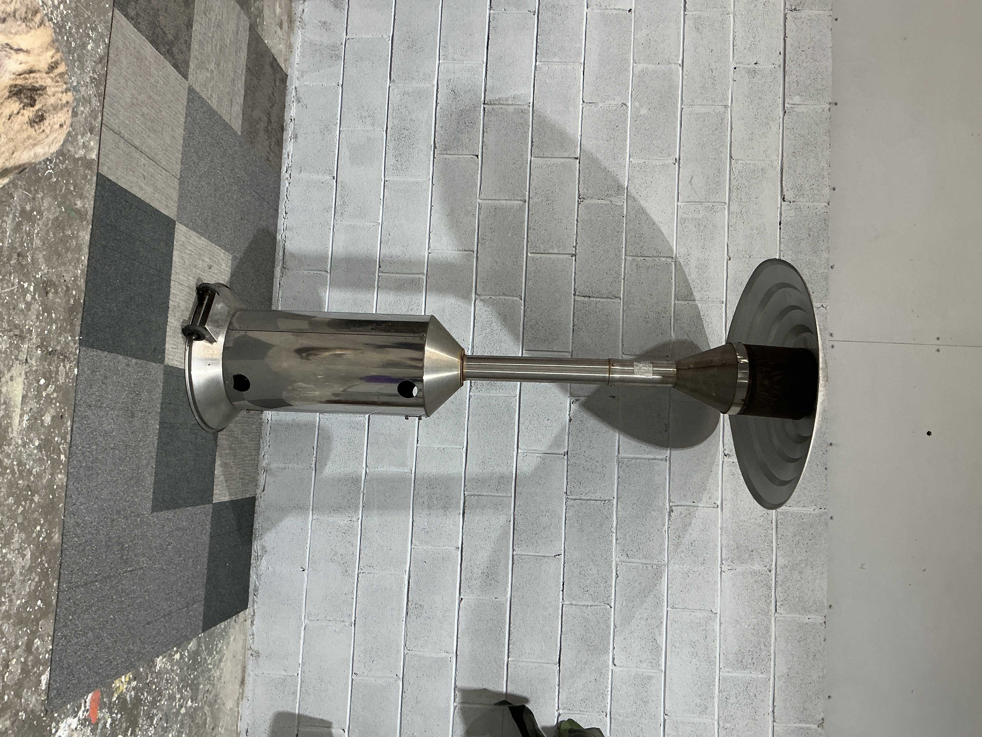 A Stainless Steel Floorstanding Liquid Propane Patio Heater