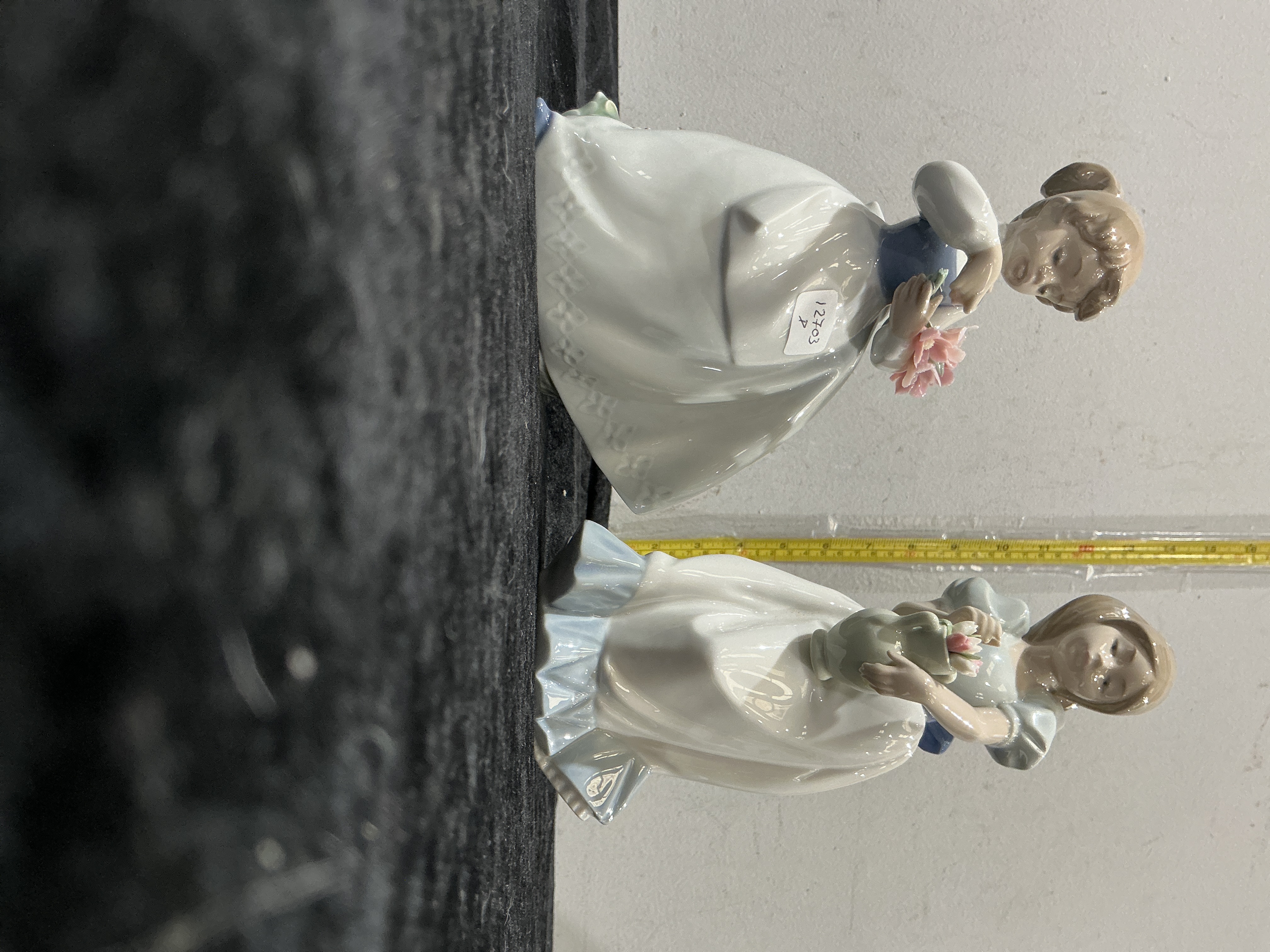 A Pair of Nao by Lladró Porcelain Figurines of Girls with Flowers