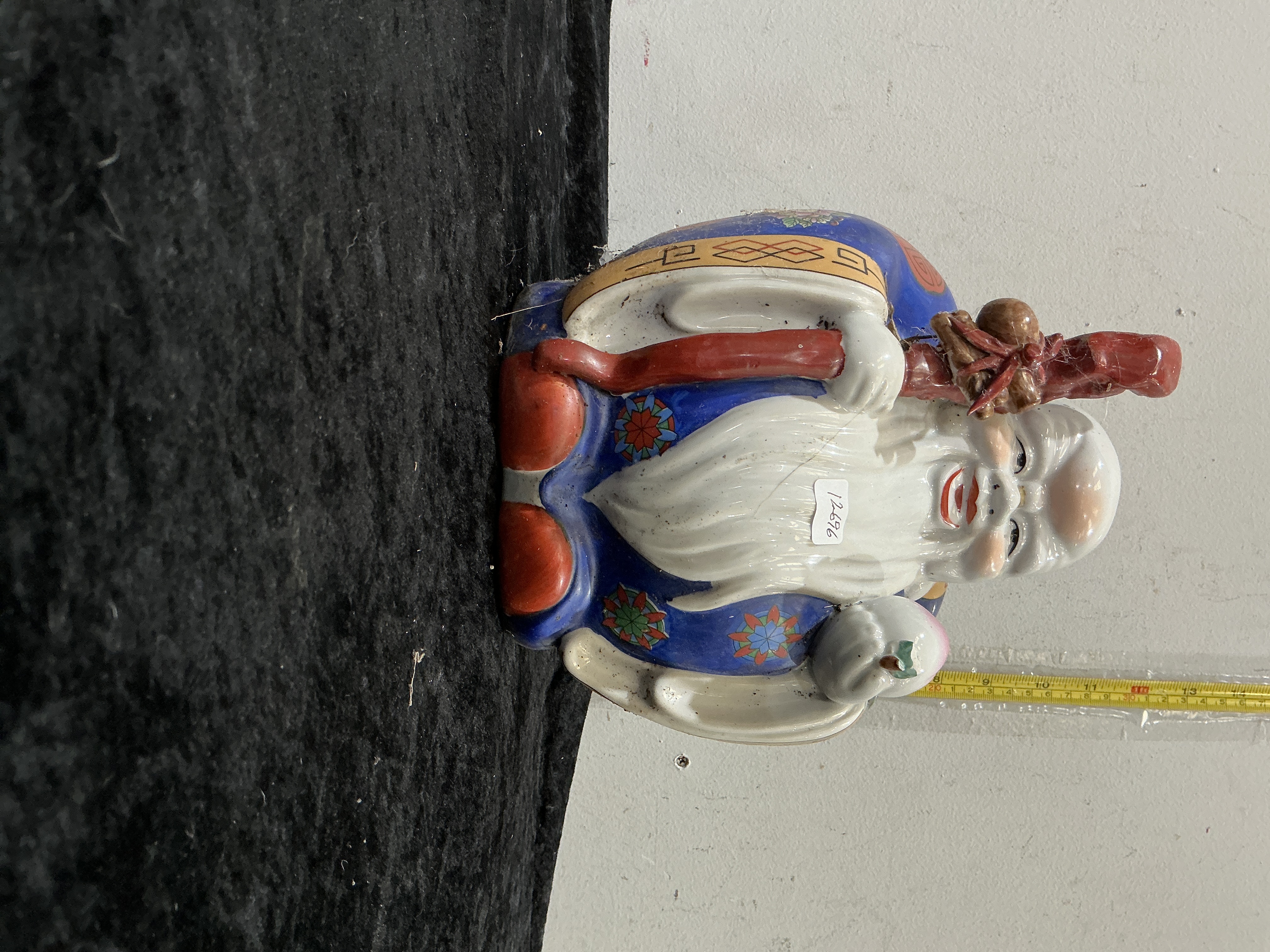 A Large Chinese Polychrome Porcelain Figure of Shou Lao