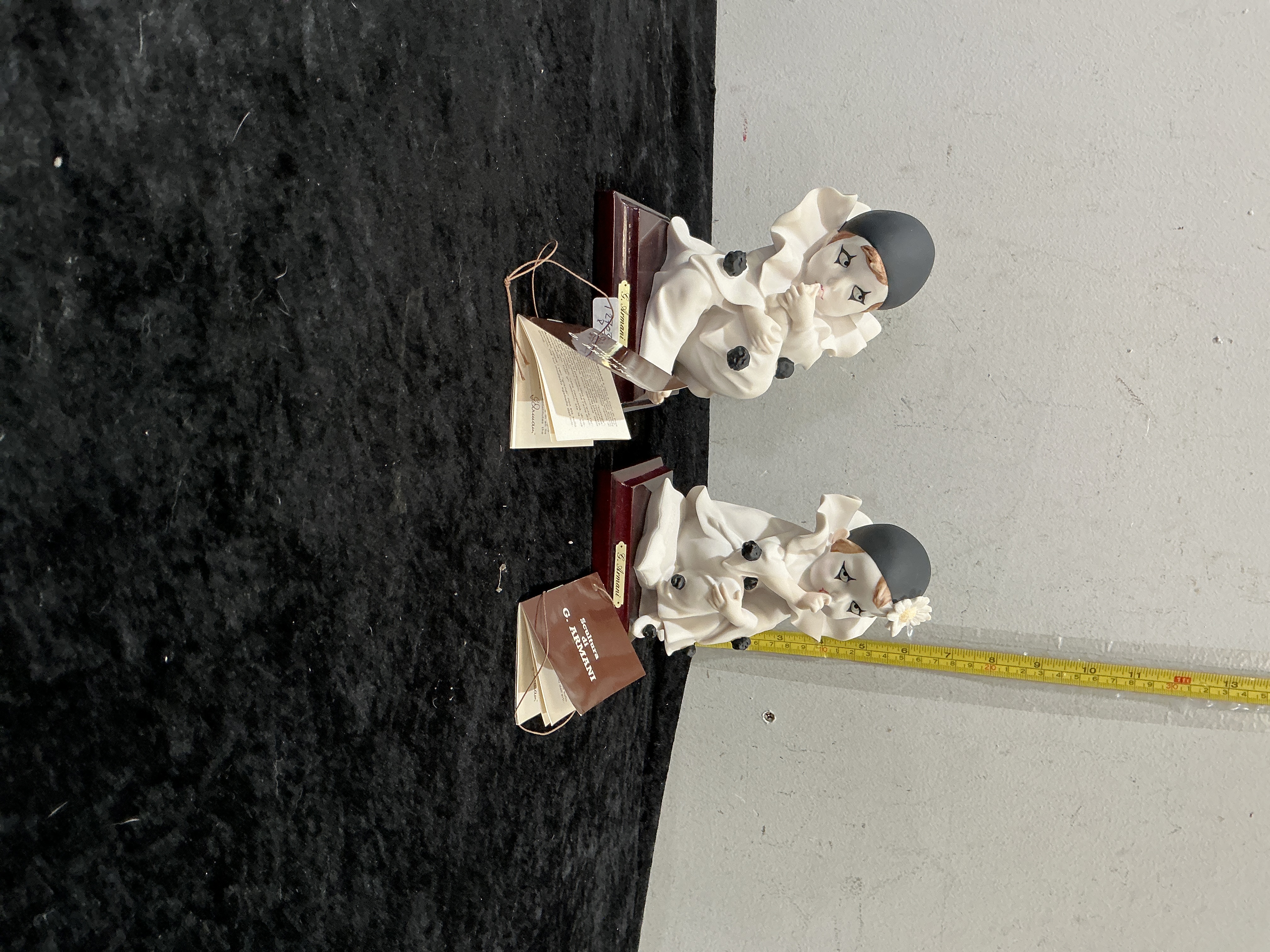 A Pair of Giuseppe Armani Bisque Porcelain Pierrot Figurines