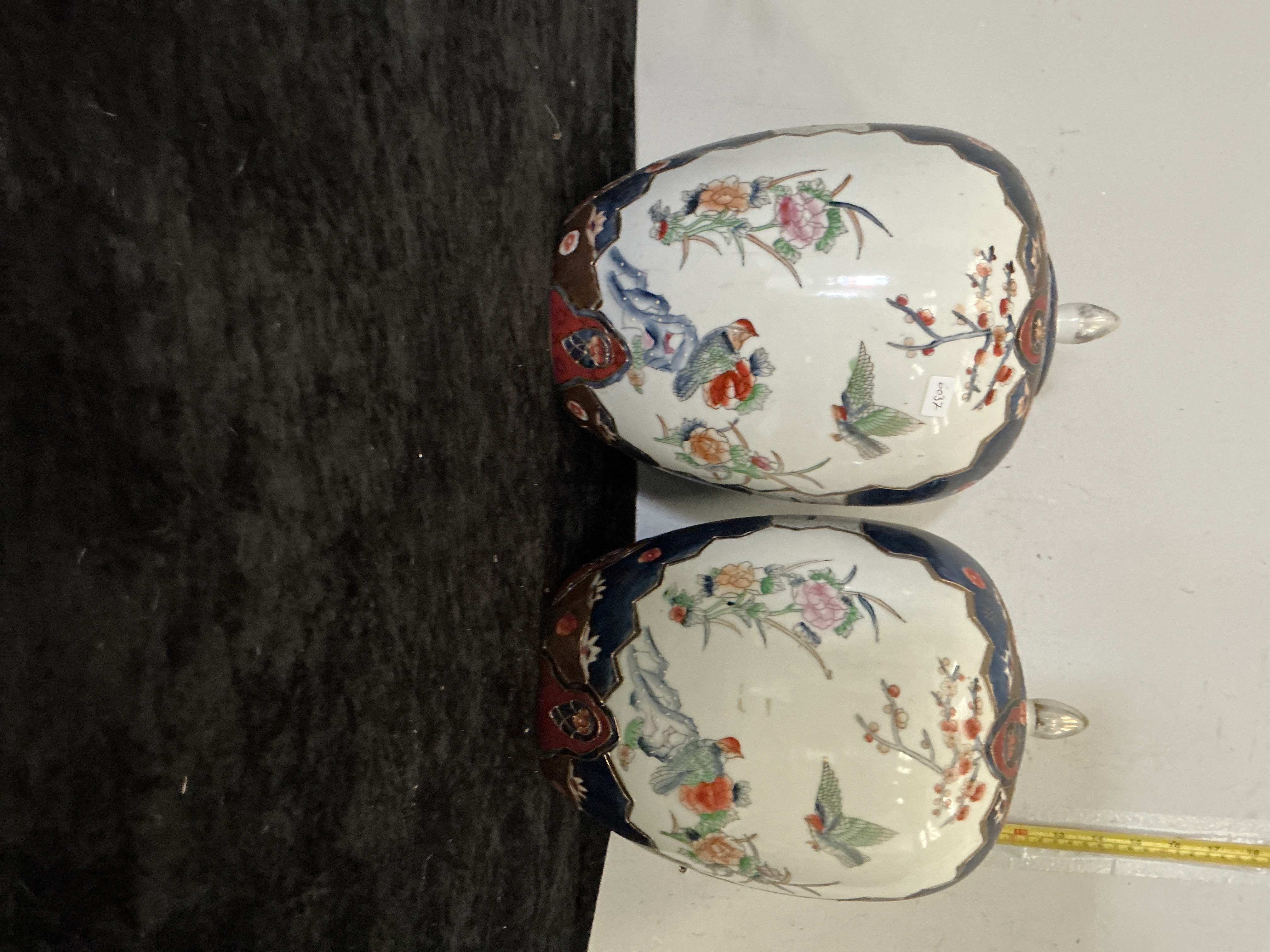 A Pair of Japanese Imari Porcelain Ginger Jars and Covers