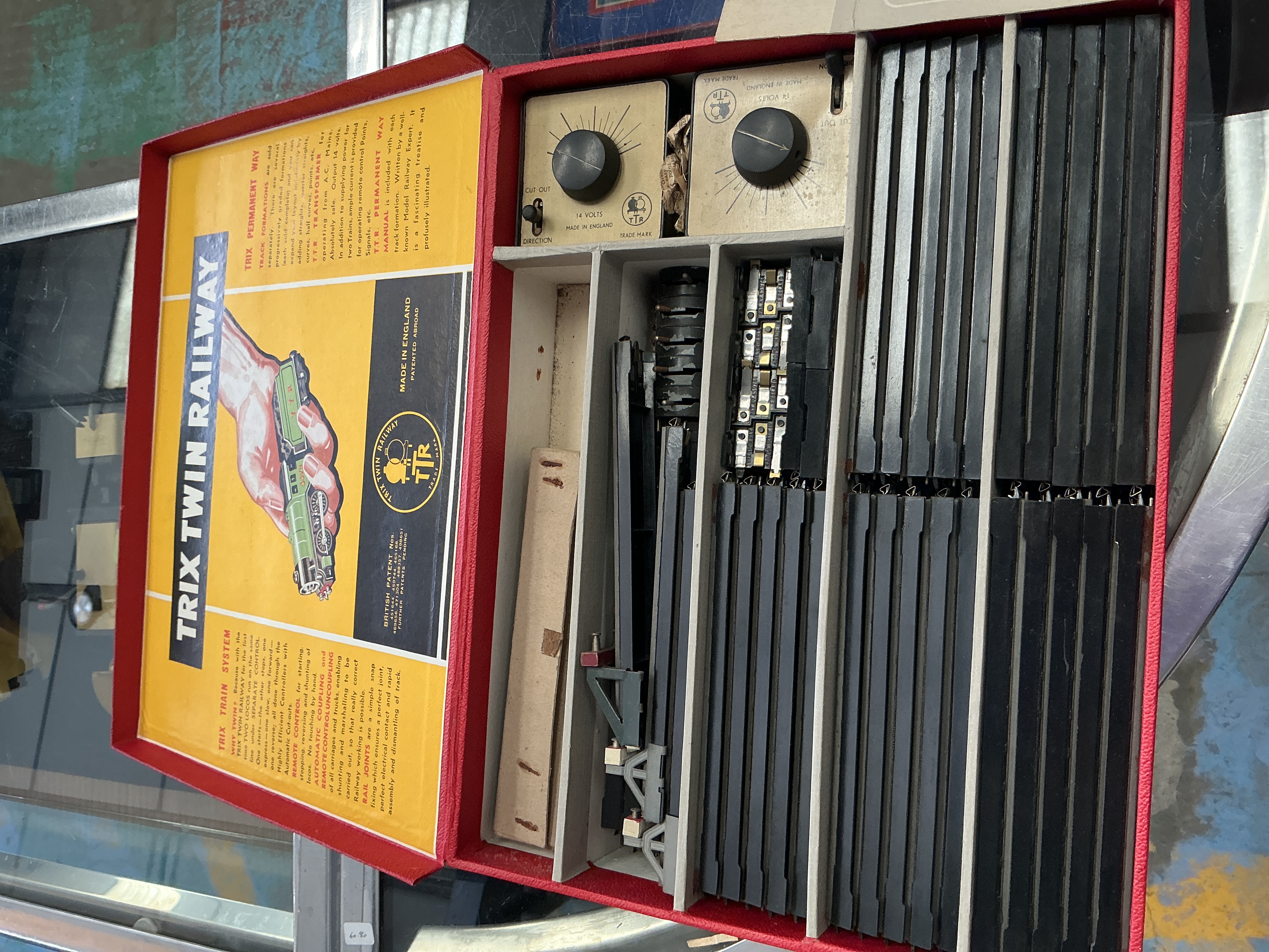 A Collection of Trix Twin Railway Three-Rail Track and Power Controllers in Original Box