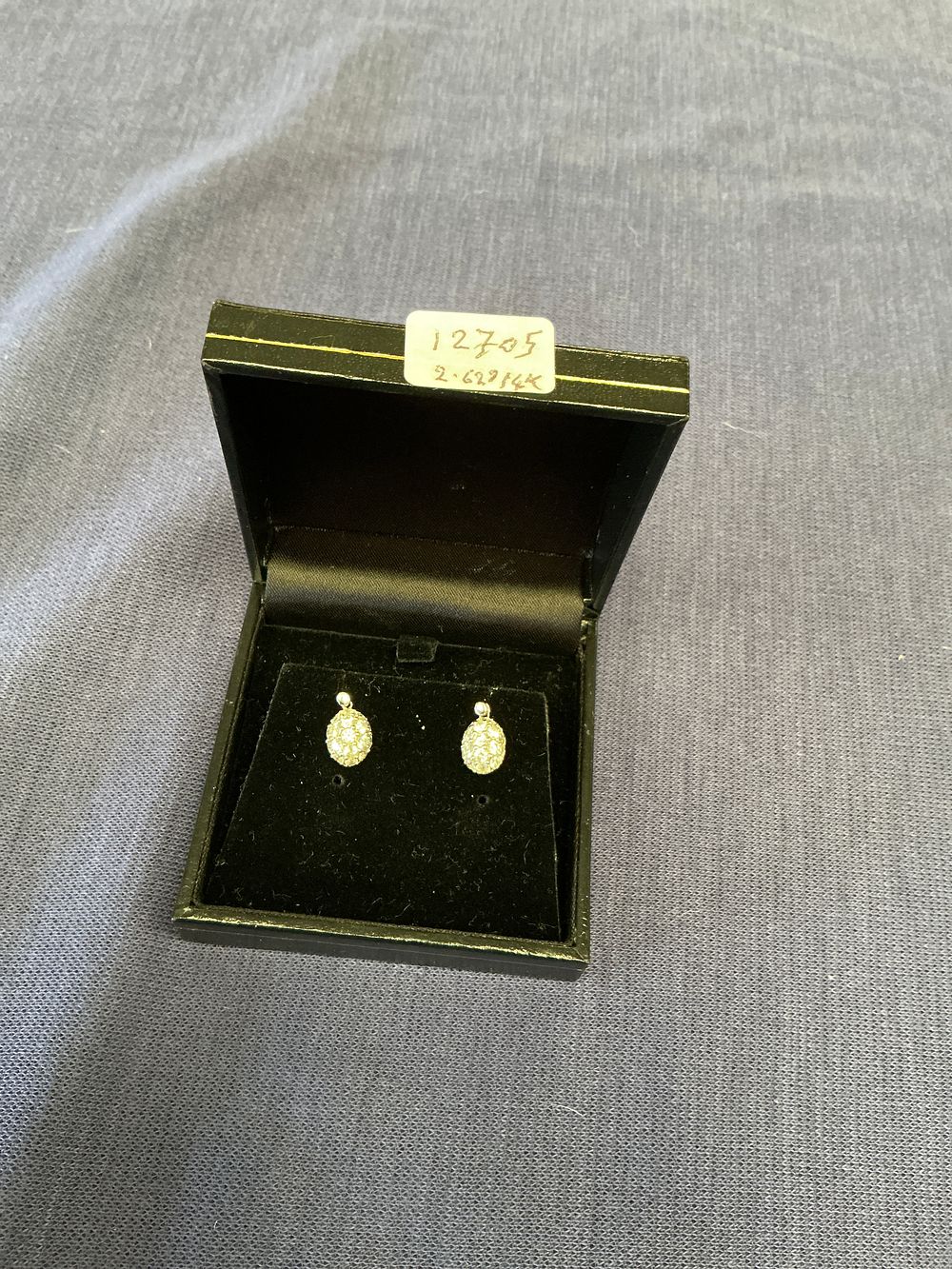 Lot 280: A Pair of 14 Carat Gold and Diamond Cluster Stud Earrings