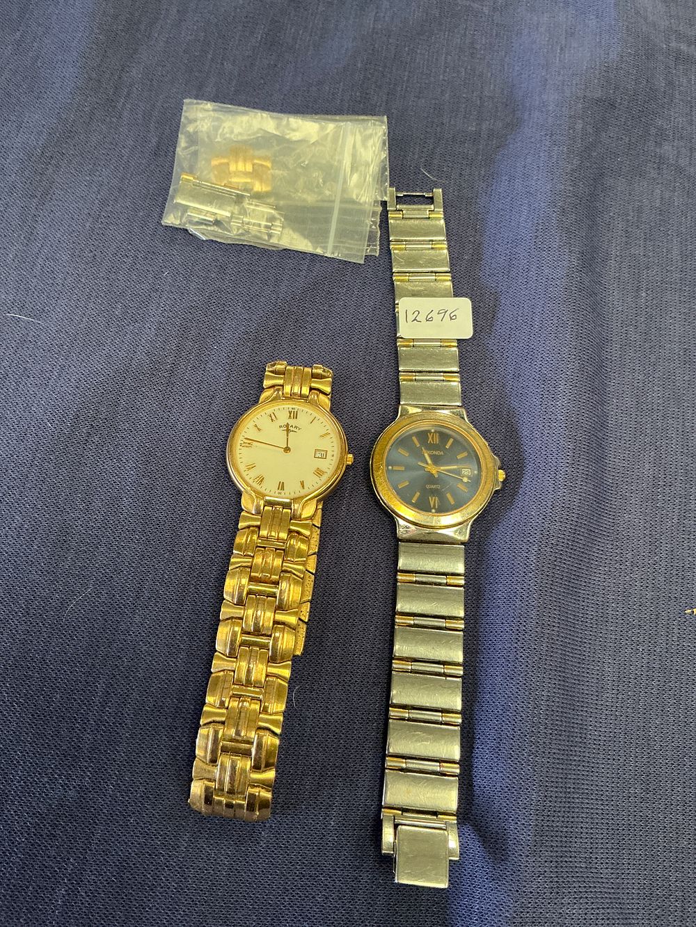 Lot 297: Two Rotary quartz wristwatches and a selection of spare bracelet links