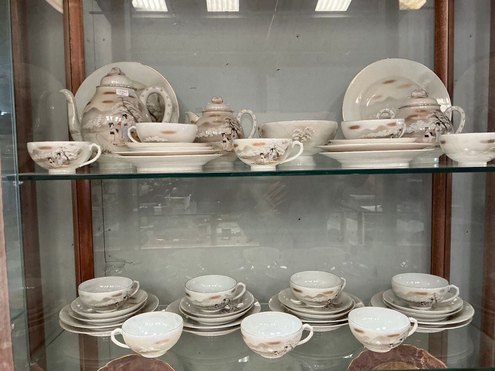Lot 330: A Collection of Kutani Eggshell Porcelain Tea and Coffee Service Pieces