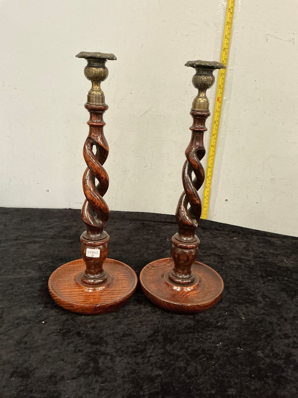 Lot 359: A Pair of English Oak Open Barley-Twist Candlesticks