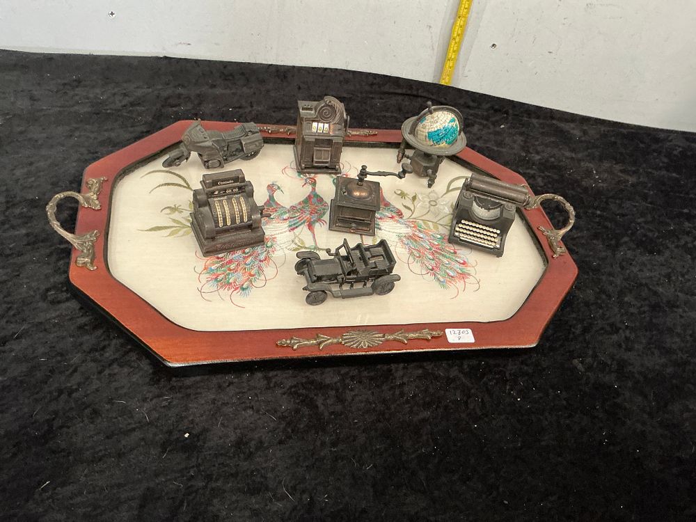 Lot 376: A Collection of Play Me Die-Cast Miniature Pencil Sharpeners on a Decorative Peacock Motif Tray