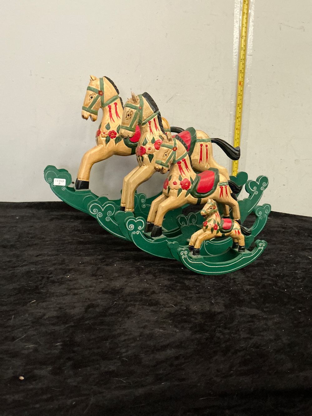 Lot 380: A Polychrome Carved and Painted Wooden Figural Group of Leaping Horses