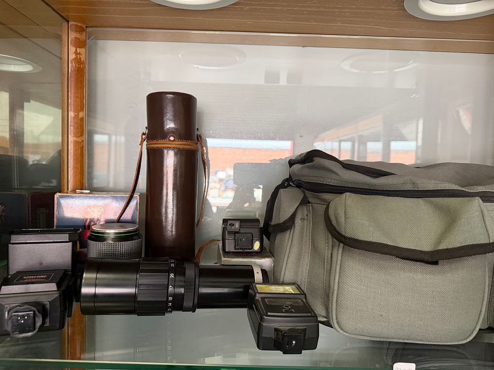 Lot 200: A Collection of Photographic Equipment and Accessories Including Miranda and Vivitar Flash Units and Lenses