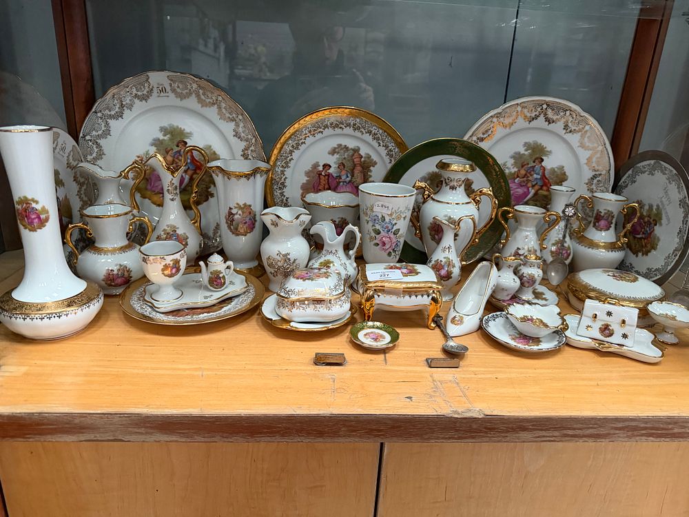 Lot 227: A Collection of Gilt-Decorated White Porcelain Giftware and Anniversary Commemoratives with Courting Couple Vignettes