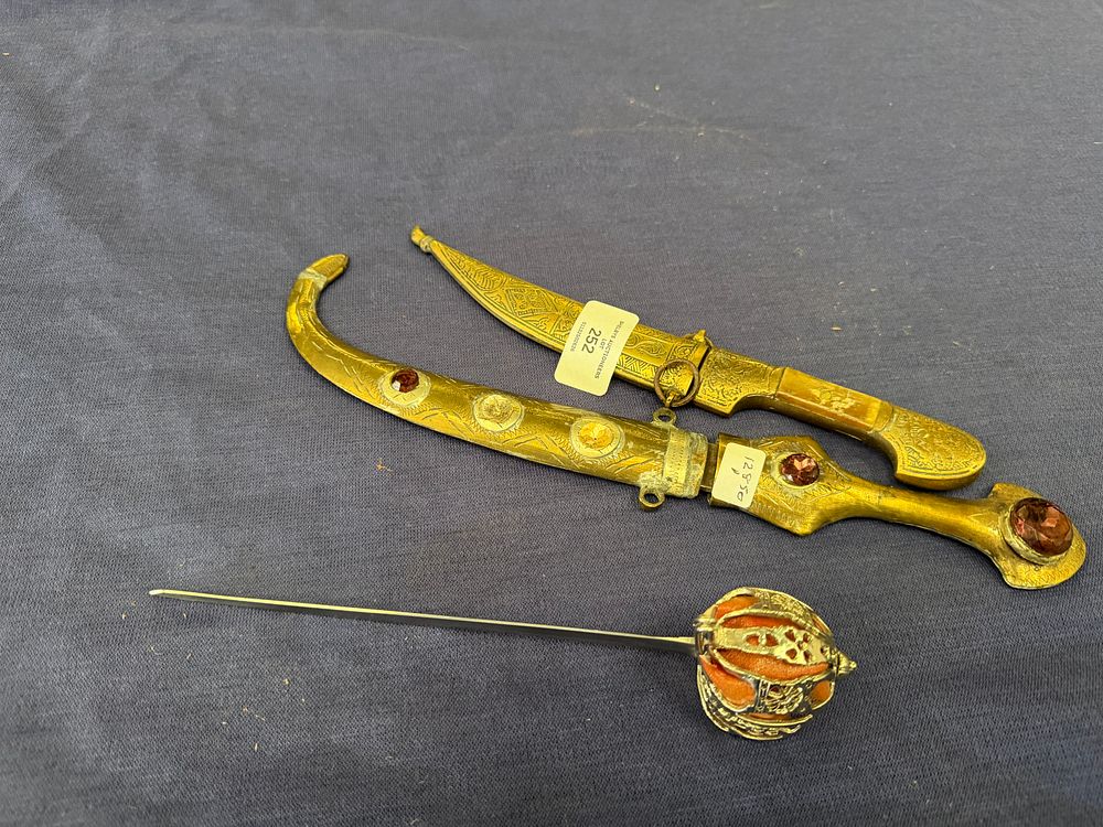 Lot 252: A Trio of Decorative Middle Eastern Style Daggers and an Edged Implement