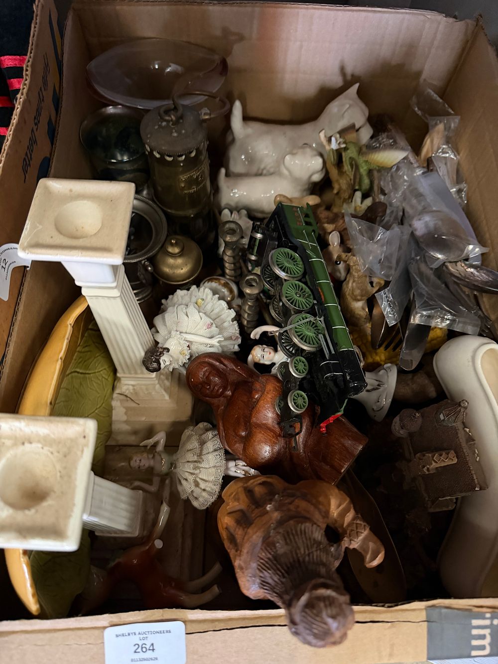 Lot 264: An Assortment of Decorative Objects and Collectibles including a Model Locomotive and Ceramic Figures