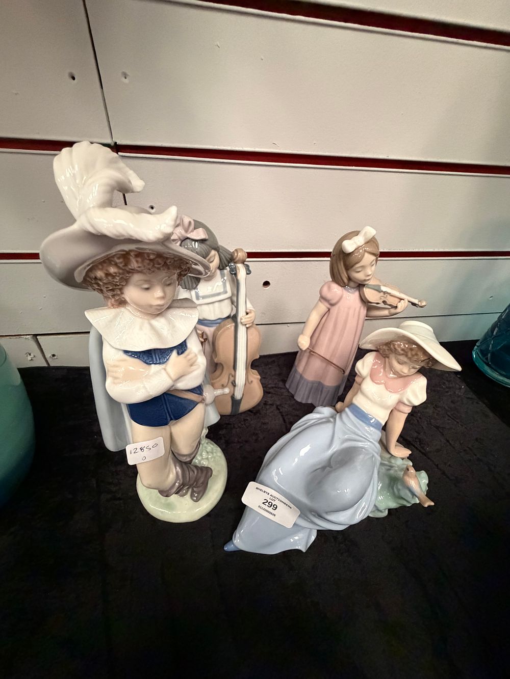 Lot 299: A Trio of Glazed Porcelain Figurines with Musical and Figurative Themes nao