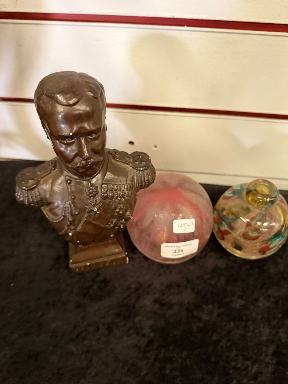 Lot 335: A Trio of Decorative Items Comprising a Patinated Cast Metal Bust of Napoleon Bonaparte and Two Glass Paperweights