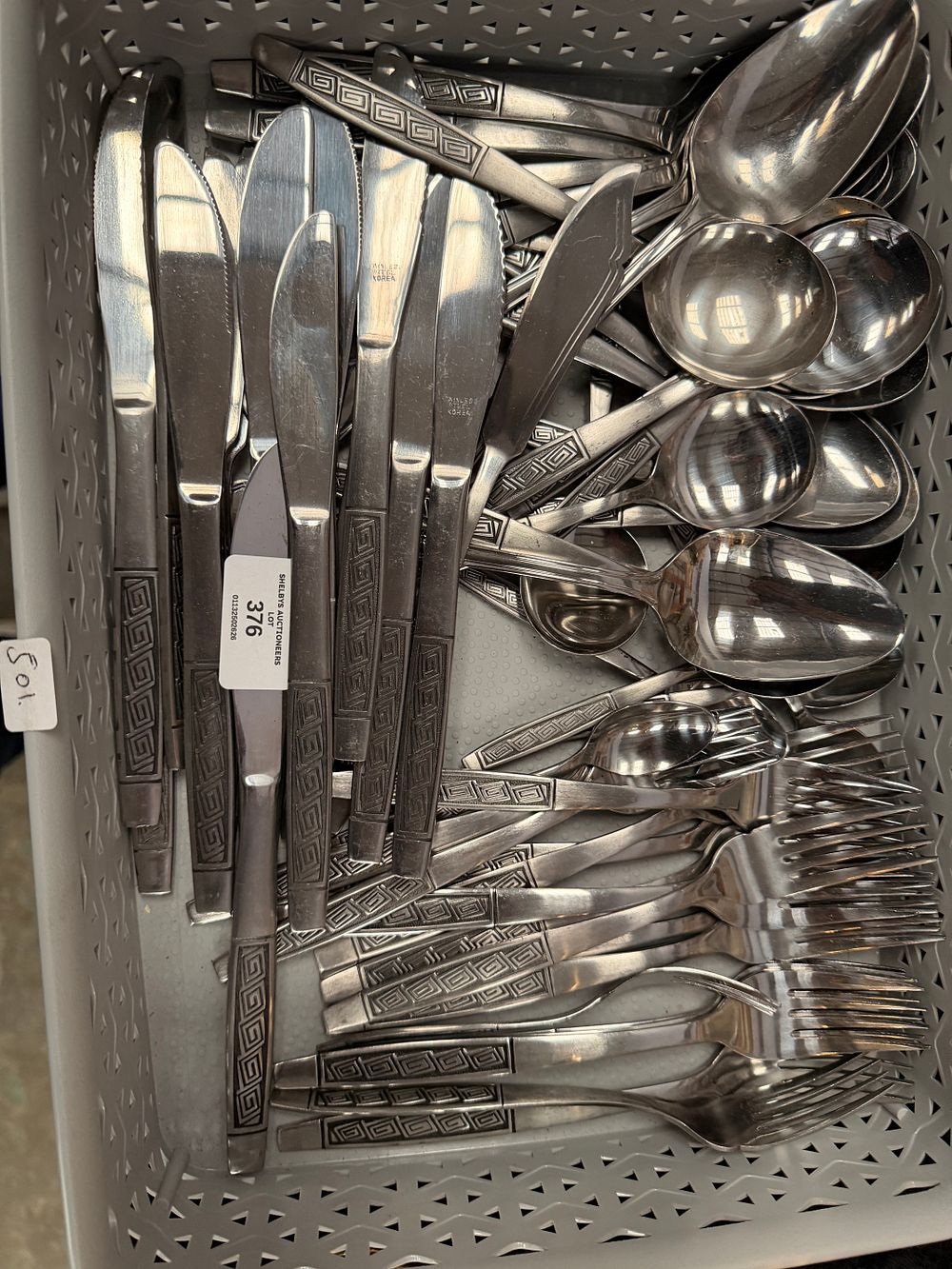 Lot 376: An Assortment of Korean Stainless Steel Flatware in a Greek Key Pattern