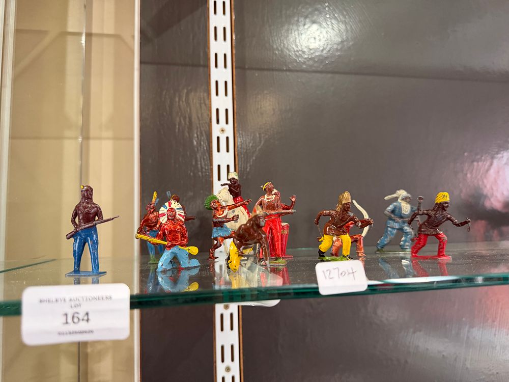 Lot 159: A Collection of Ten Vintage Native American Indian Toy Figures