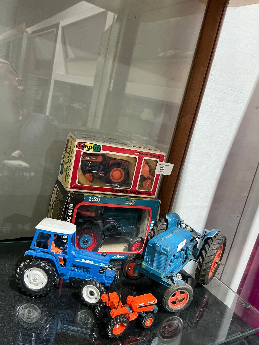 Lot 201: A Collection of Die-Cast and Tinplate Model Tractors including Diapet and Kovap Examples