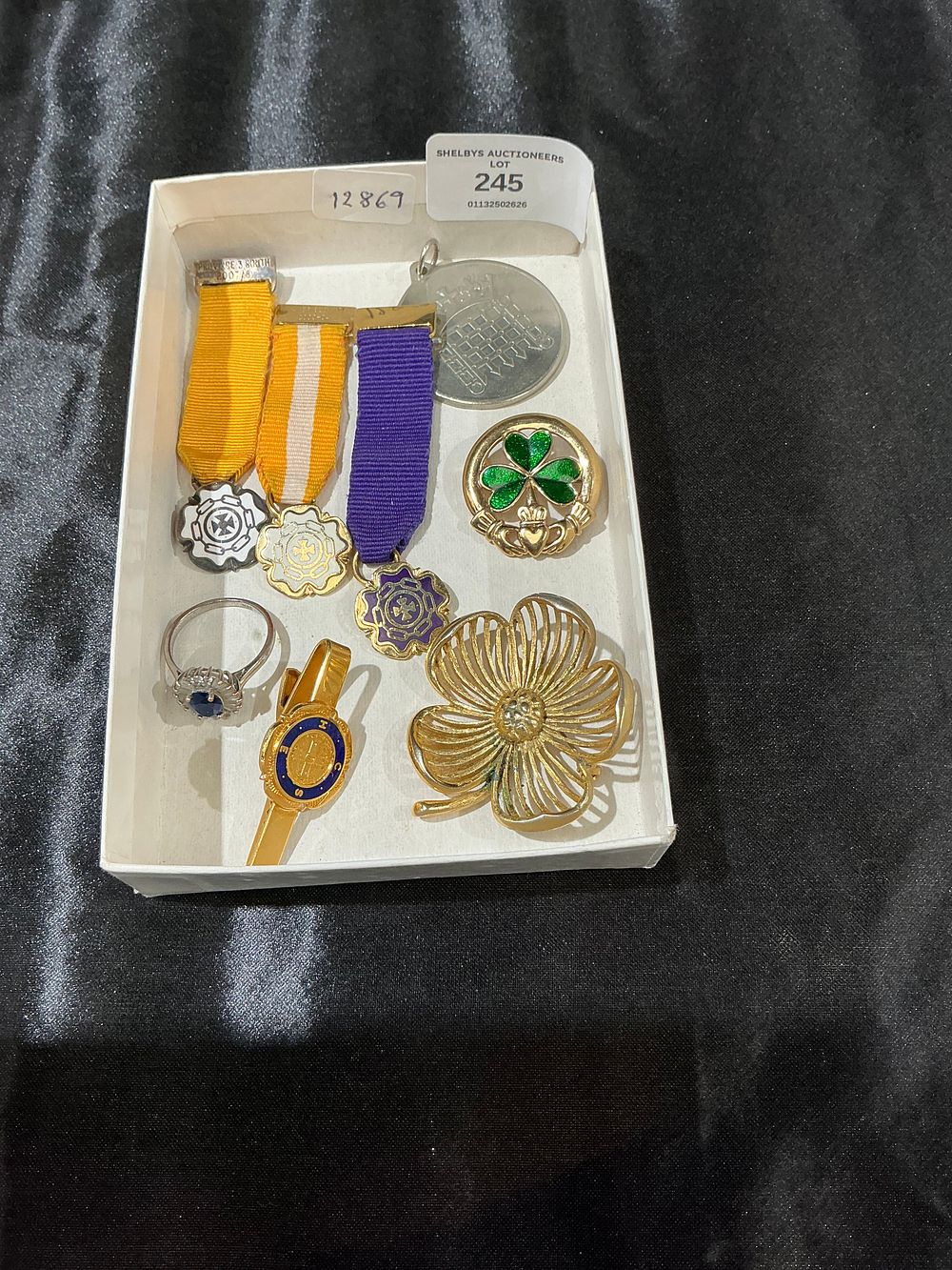 Lot 245: A Collection of Assorted Jewellery and Commemorative Items including Brooches, a Ring, and Medals a few silver pieces
