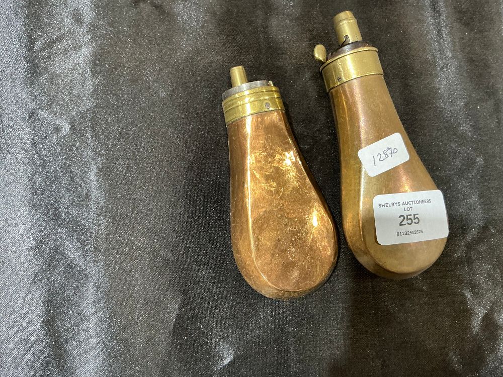 Lot 255: A Pair of Copper and Brass Powder Flasks