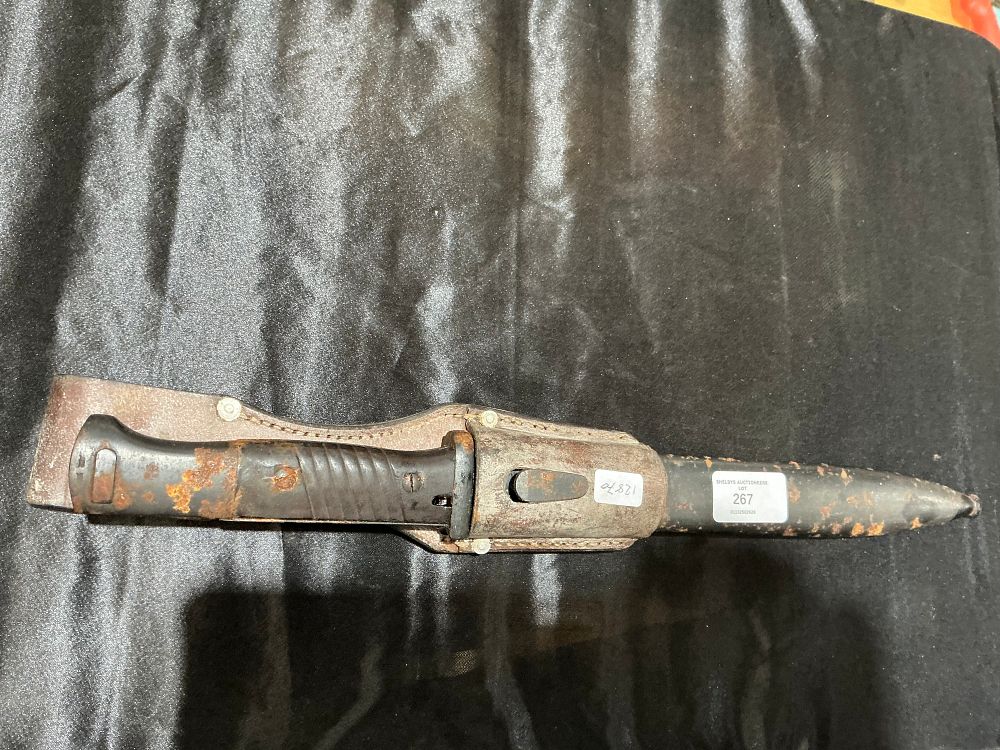 Lot 267: A Mid-20th Century German K98 Pattern Bayonet with Steel Scabbard and Leather Frog