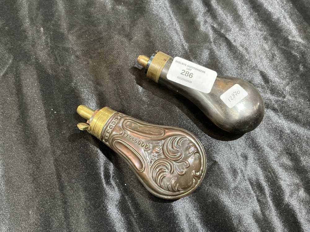 Lot 286: Two 19th-Century Metal Powder Flasks