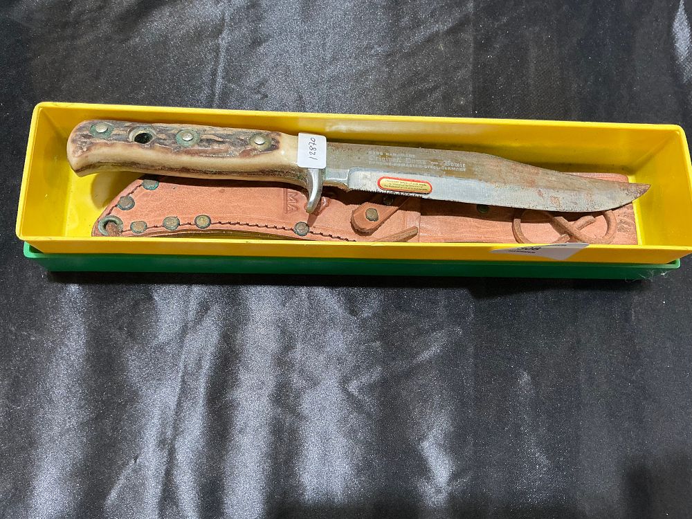 Lot 308: A German Puma Model 6396 Bowie Knife with Stag Horn Handle Sheath and Original Box