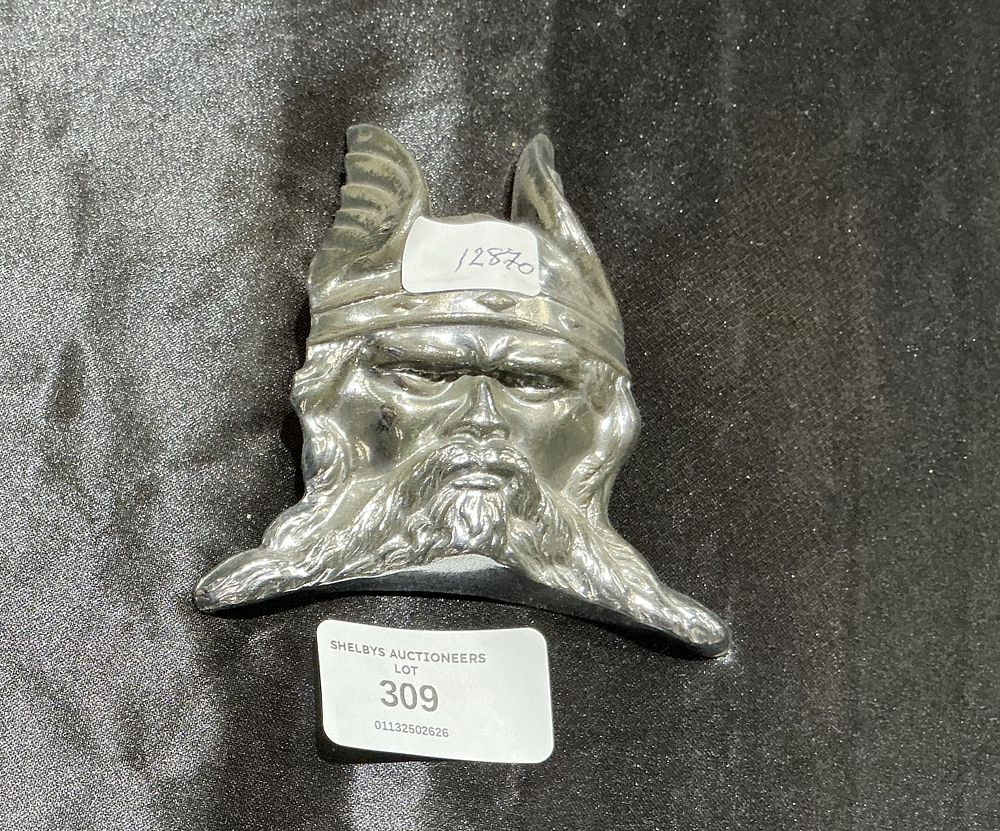 Lot 309: A cast metal car radiator mascot in the form of a Viking head