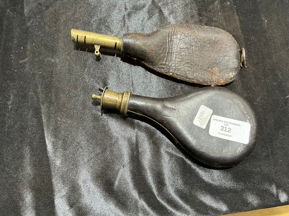 Lot 312: Two 19th-Century Leather and Brass Shooting Flasks