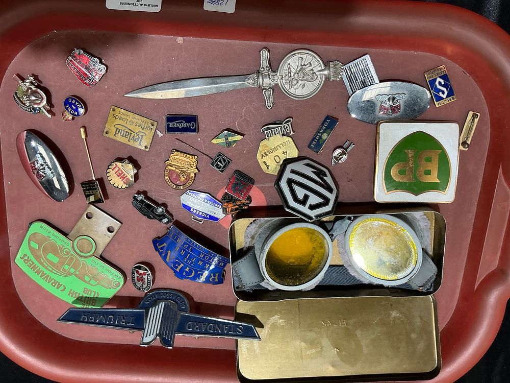 Lot 314: A Collection of Vintage Automotive, Industrial, and Transport Badges and Collectibles