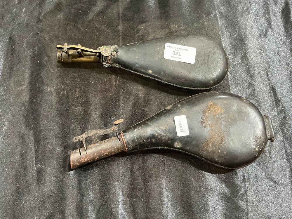 Lot 321: Two nineteenth-century leather-bodied powder flasks