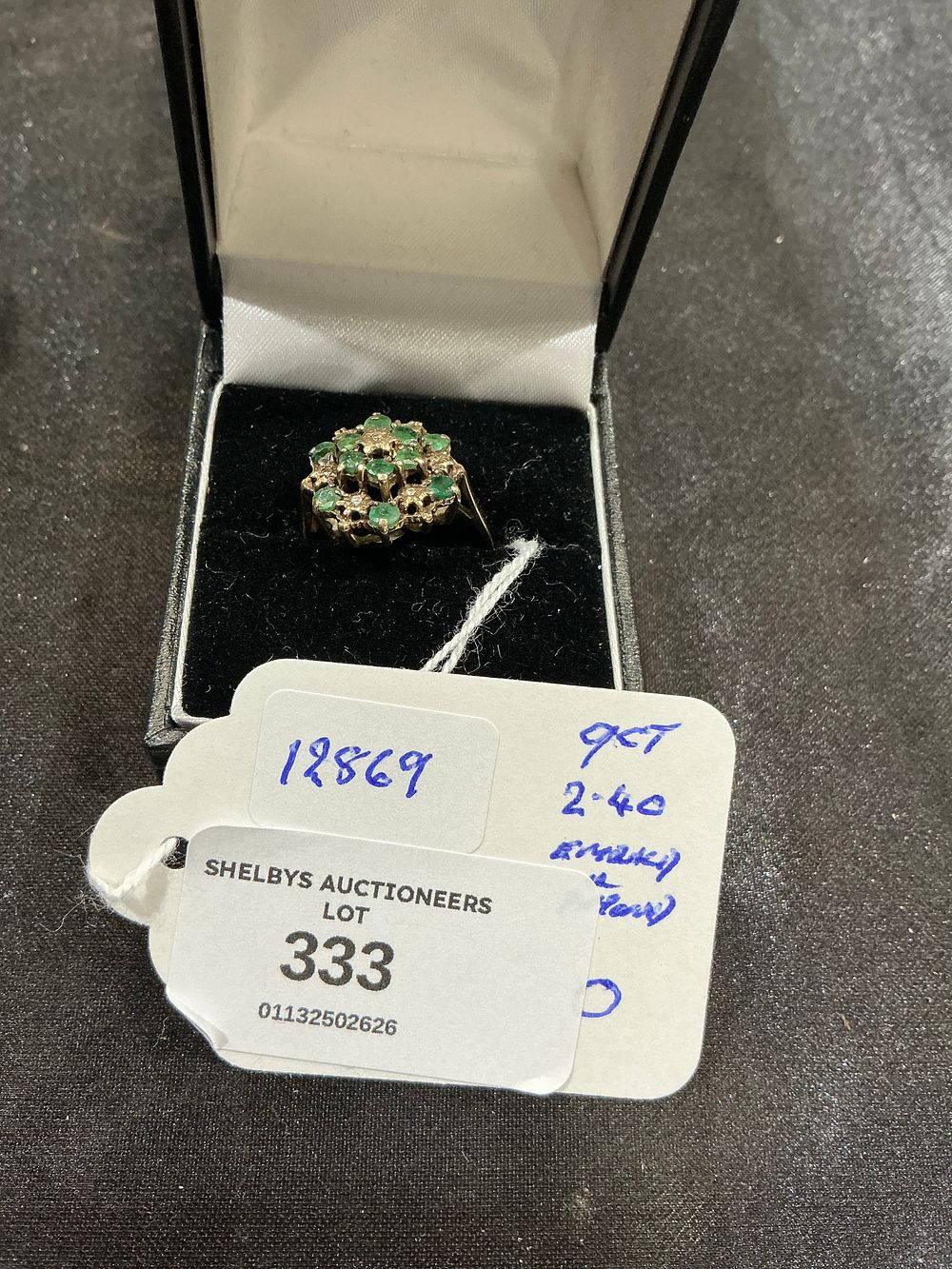 Lot 333: A 9ct Yellow Gold Emerald Cluster Ring