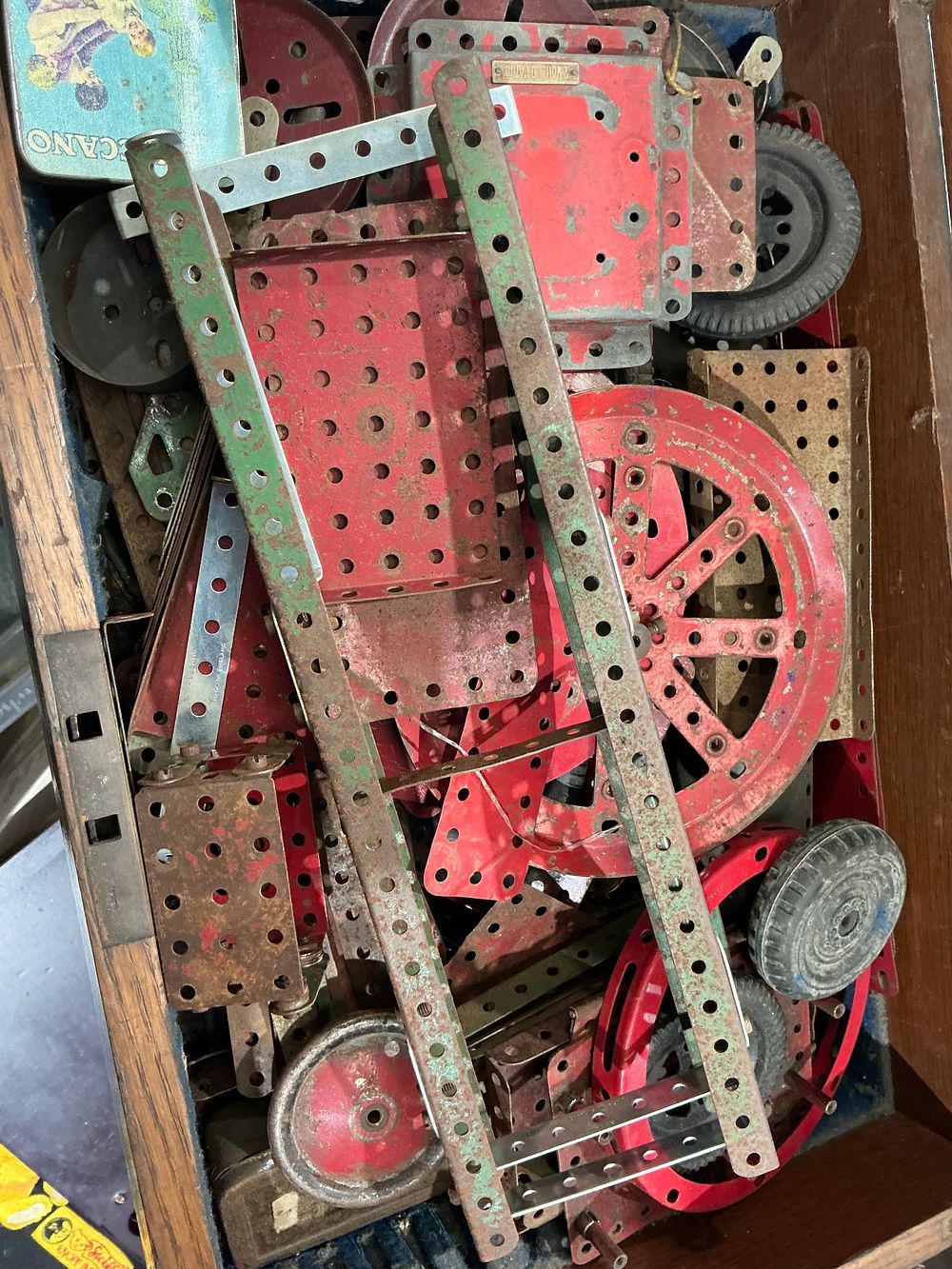 Lot 261: A Collection of Vintage Meccano Metal Construction Set Components in a Wooden Box