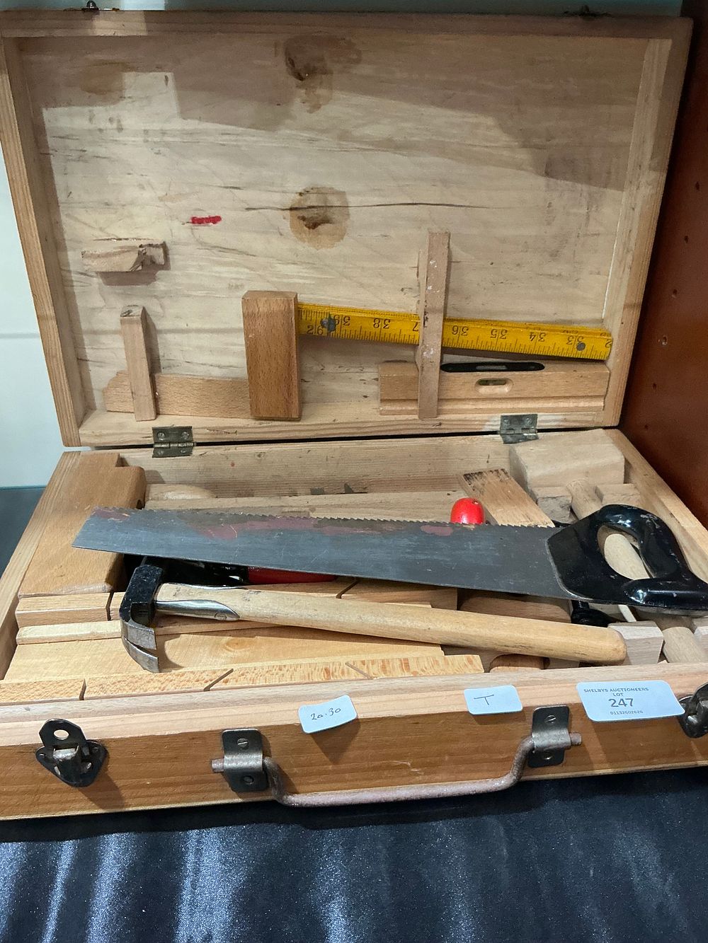 Lot 247: A Vintage Wooden Child's Tool Chest with a Collection of Hand Tools