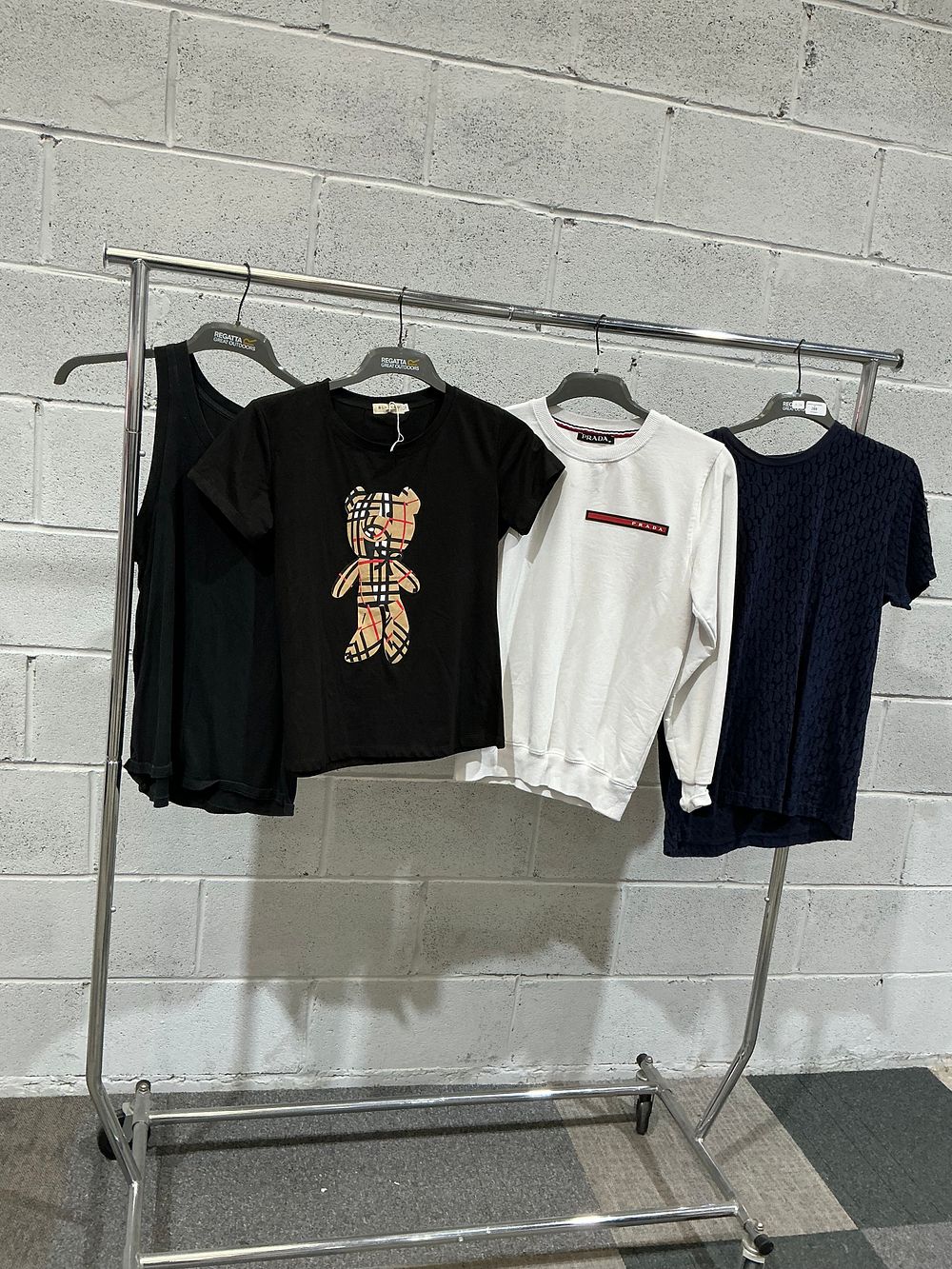 Lot 269: A Group of Contemporary Designer-Style Garments including a Prada Sweatshirt style