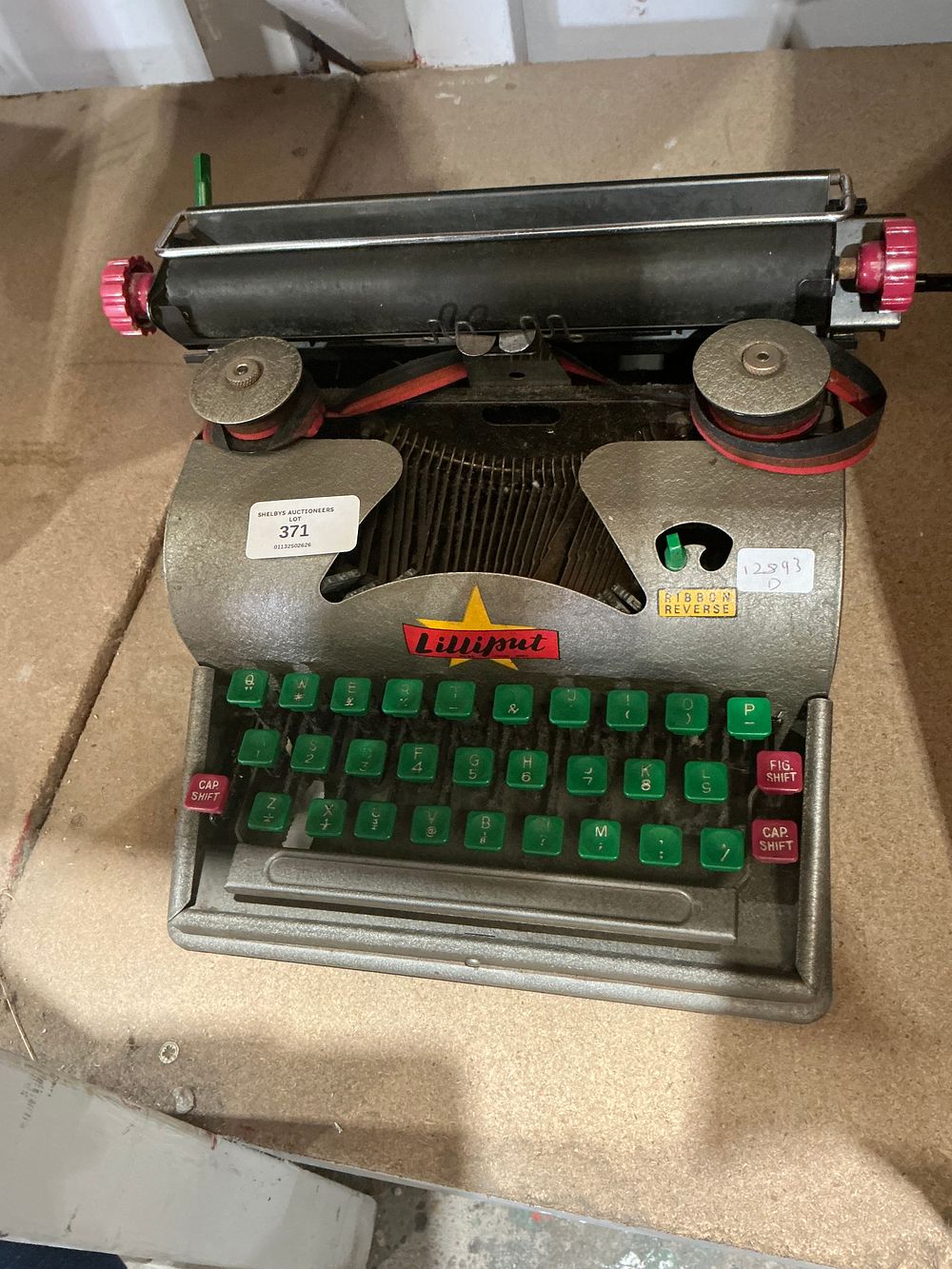 Lot 371: A Lilliput Child's Toy Typewriter