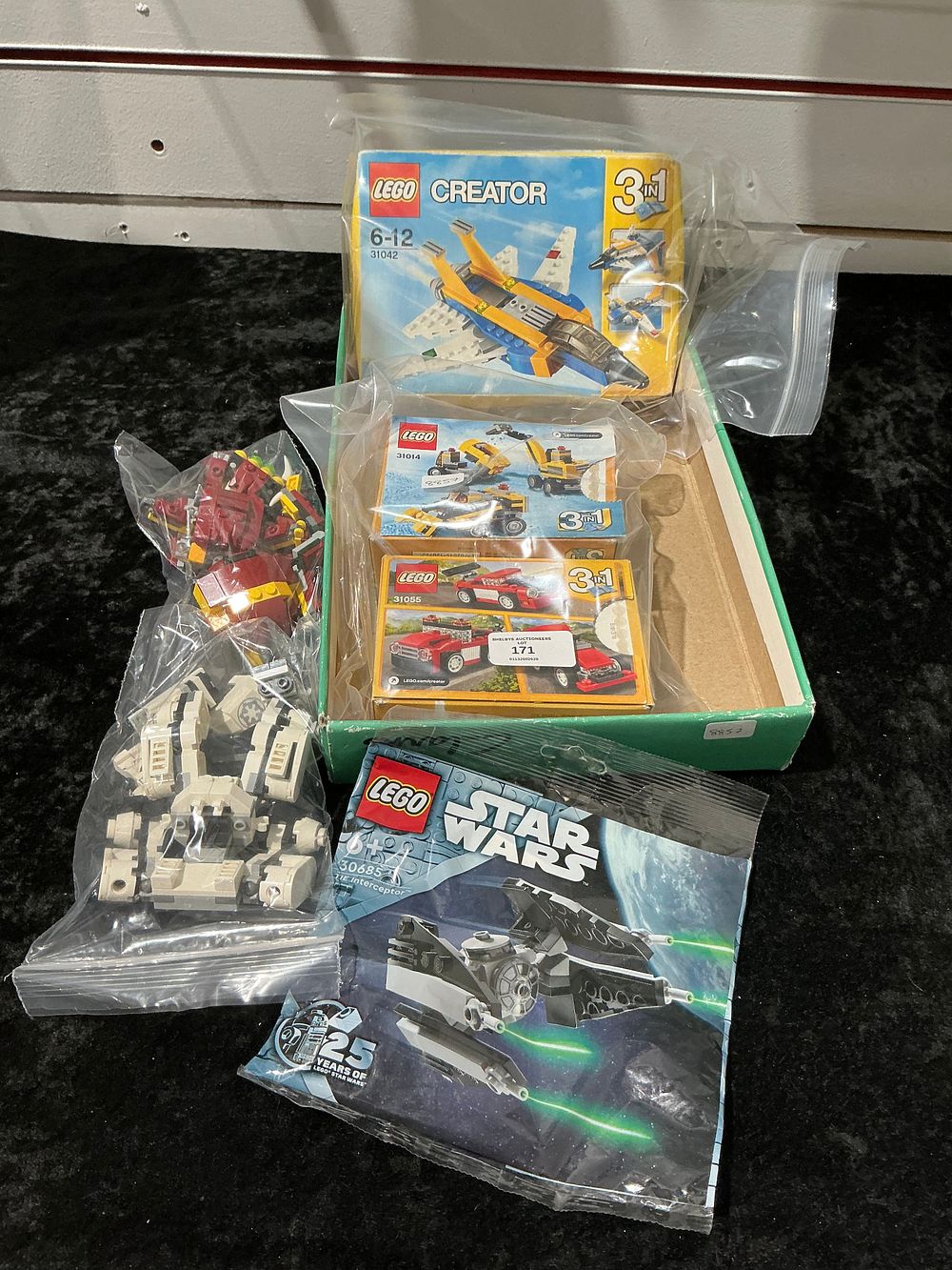 Lot 171: A Collection of LEGO Construction Sets and Loose Elements Including Creator and Star Wars