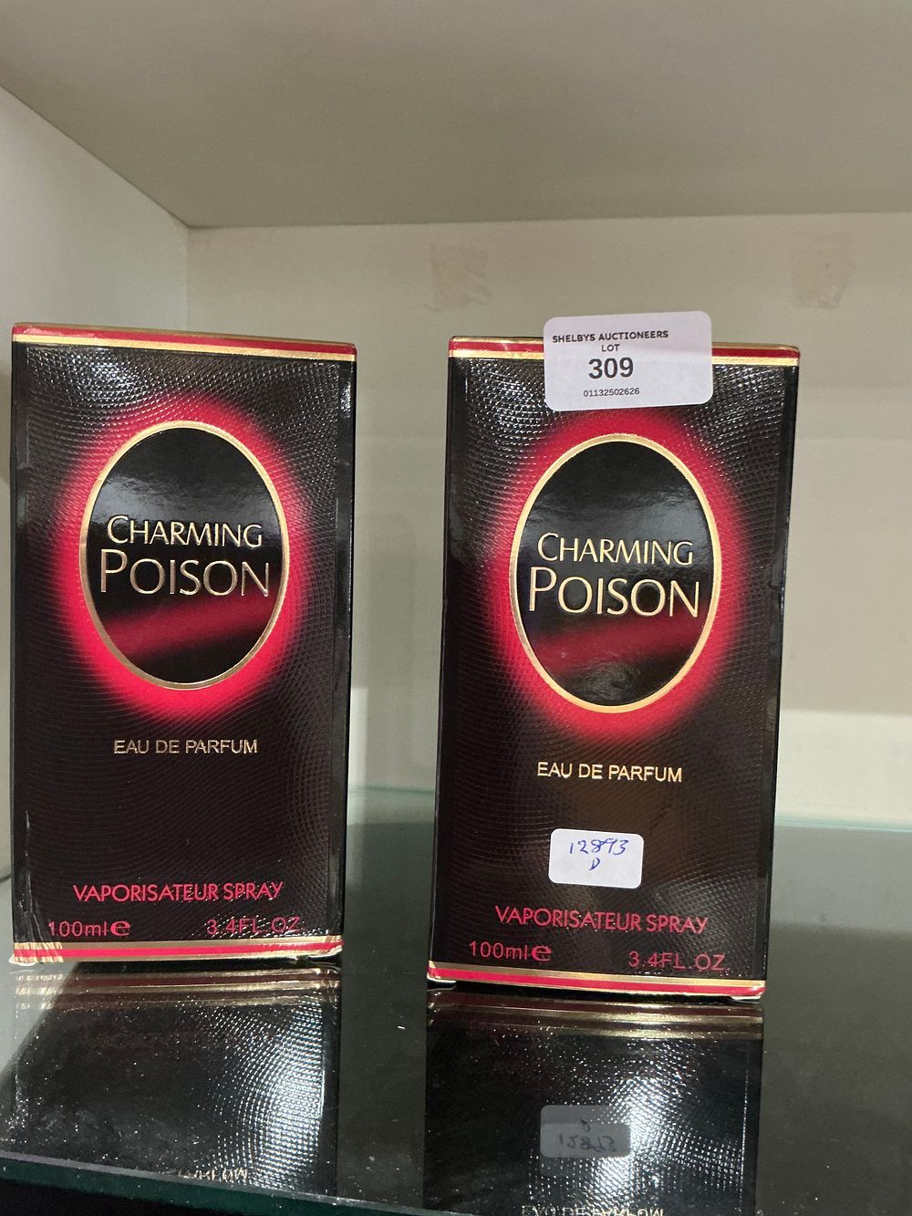 Lot 309: A Pair of Charming Poison style replicas Eau de Parfum Fragrance
