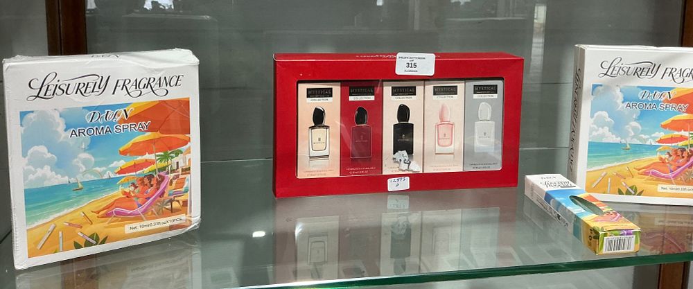 Lot 315: A Collection of Leisurely Fragrance Dawn Aroma Sprays and a Mystical Collection Perfume Set