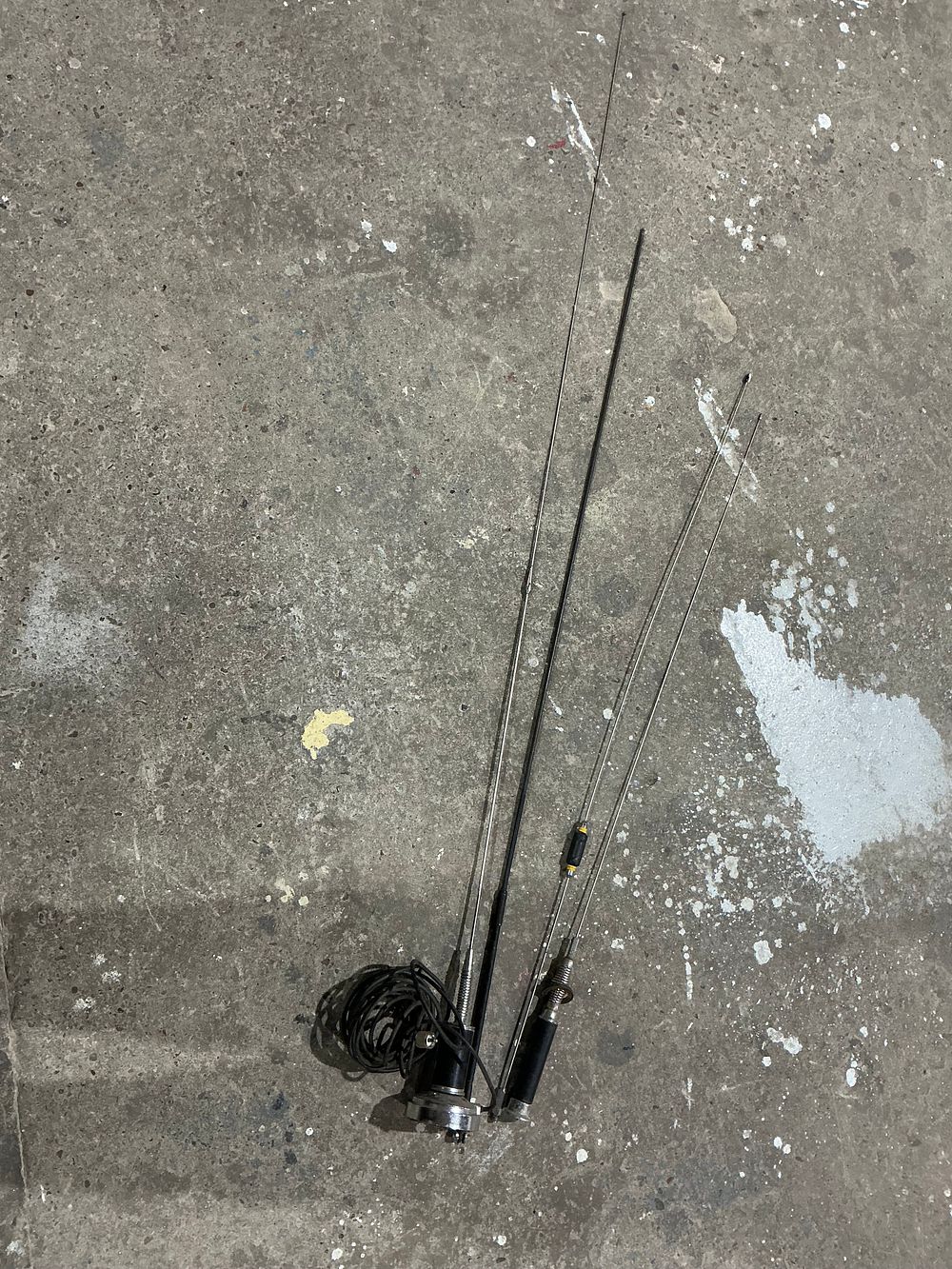 Lot 5: A Group of Three Cb Radio Whip Antennas and Mounting Hardware
