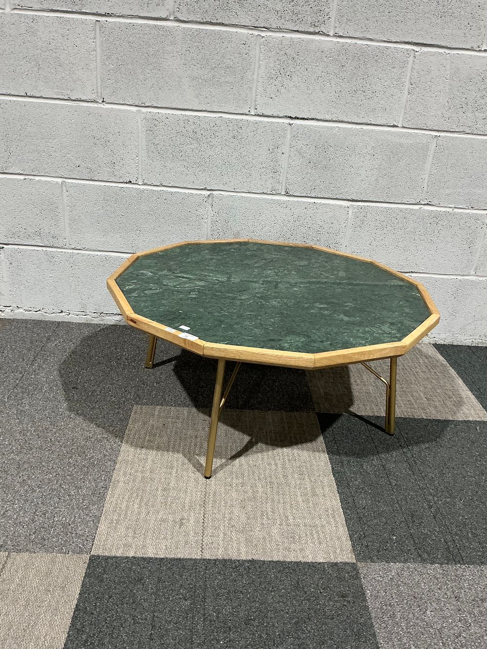 Lot 24: A mid to late twentieth century octagonal low table with green marble insert top by atkinson and tyme